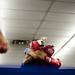 Cleveland boxer Anthony Card and Dynamic fighter Robert Rivers tie each other up in the middle of the ring on Friday, July 19. Daniel Brenner I AnnArbor.com
